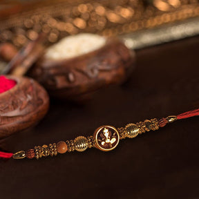 Ganesha Rakhi With Wooden Finish - Rakhi | Desimart