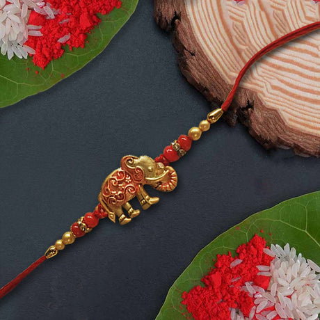 Golden Elephant Rakhi With Red Thread - Rakhi | Desimart