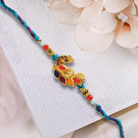 Peacock Shaped Rakhi With Multi Thread - Rakhi | Desimart