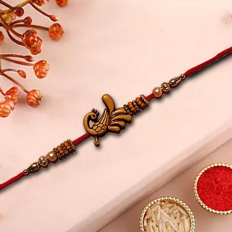 Peacock Shaped Wooden Finish Rakhi - Rakhi | Desimart